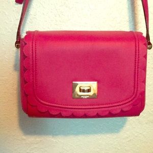 Hot pink Kate Spade purse.